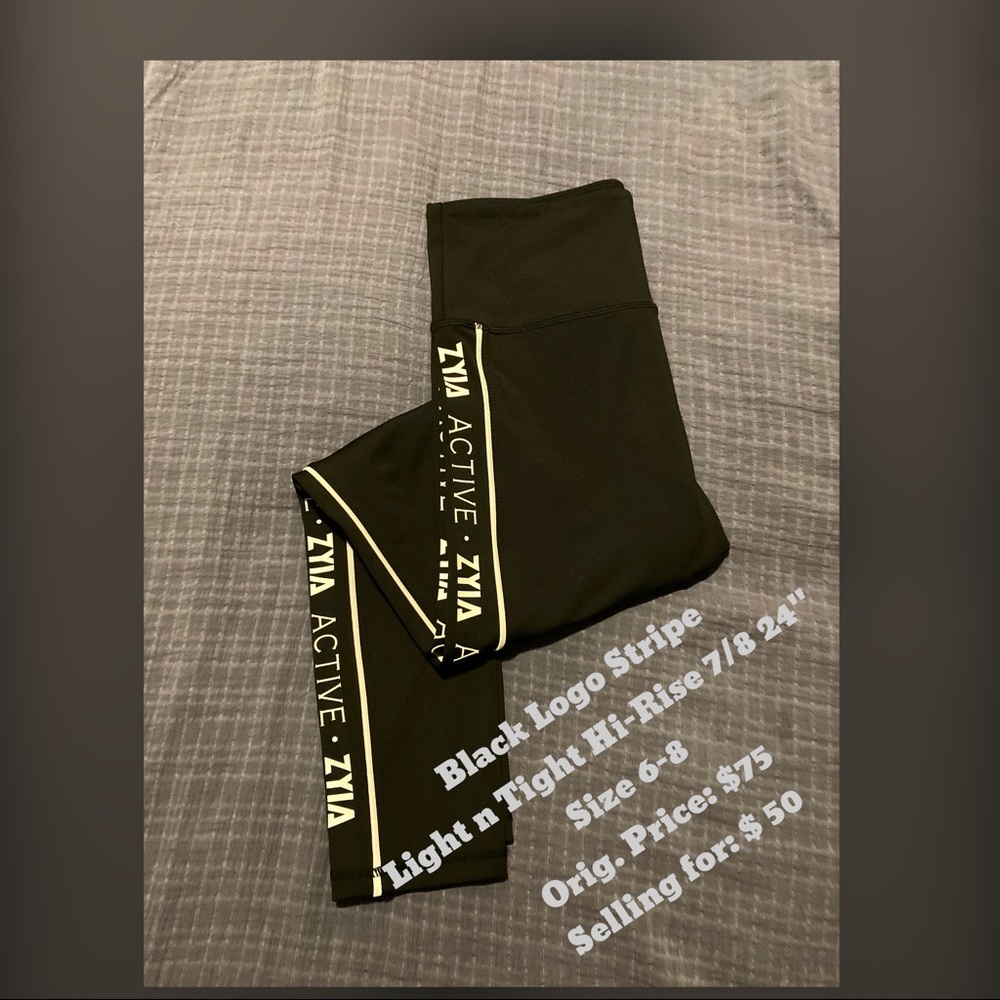 Black logo stripe light n’ tight high-rise 7/8